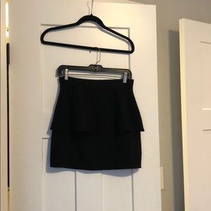 Black peplum mini skirt